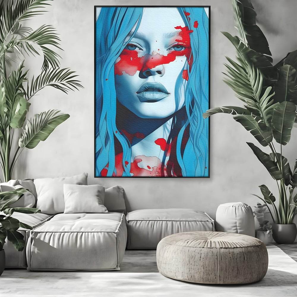 Tablou canvas cu tablou canvas cu portret albastru si pete rosii, in rama de aluminiu negru, pe perete intr-un living